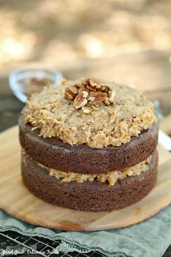 German Chocolate Cake is a deliciously moist, two layered cake frosted with a classic coconut pecan frosting. German Chocolate Cake is a two layered chocolate cake frosted with a classic coconut pecan frosting.