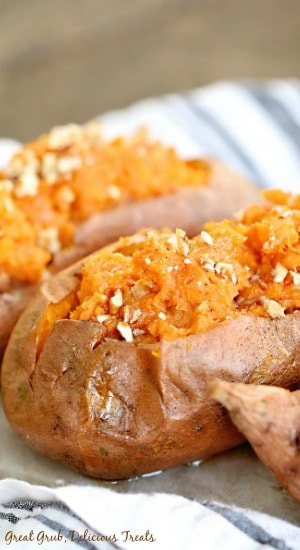Maple Pecan Sweet Potatoes are a perfect side dish full of brown sugar, cinnamon, nutmeg, maple syrup and chopped pecans.