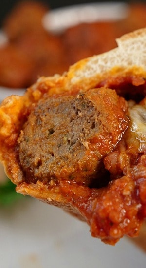 This Homemade Meatball Sub has savory tender meatballs, a delicious sauch all meshed in a roll, topped with cheese and toasted to perfection. Homemade Meatball Sub