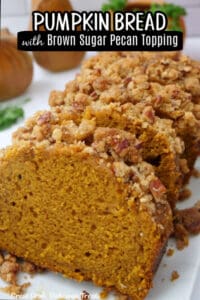 A white plate with four slices of pumpkin bread on it.
