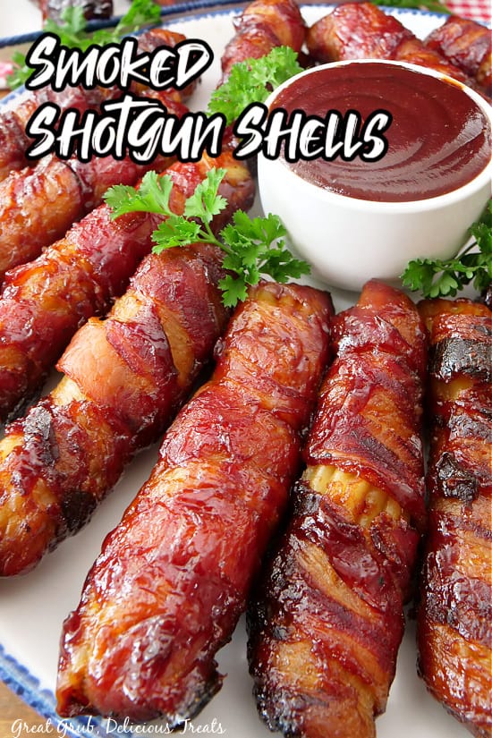 Smoked Shotgun Shells on a white plate with blue trim with a small white bowl filled with BBQ sauce, and the title overlay at the top.